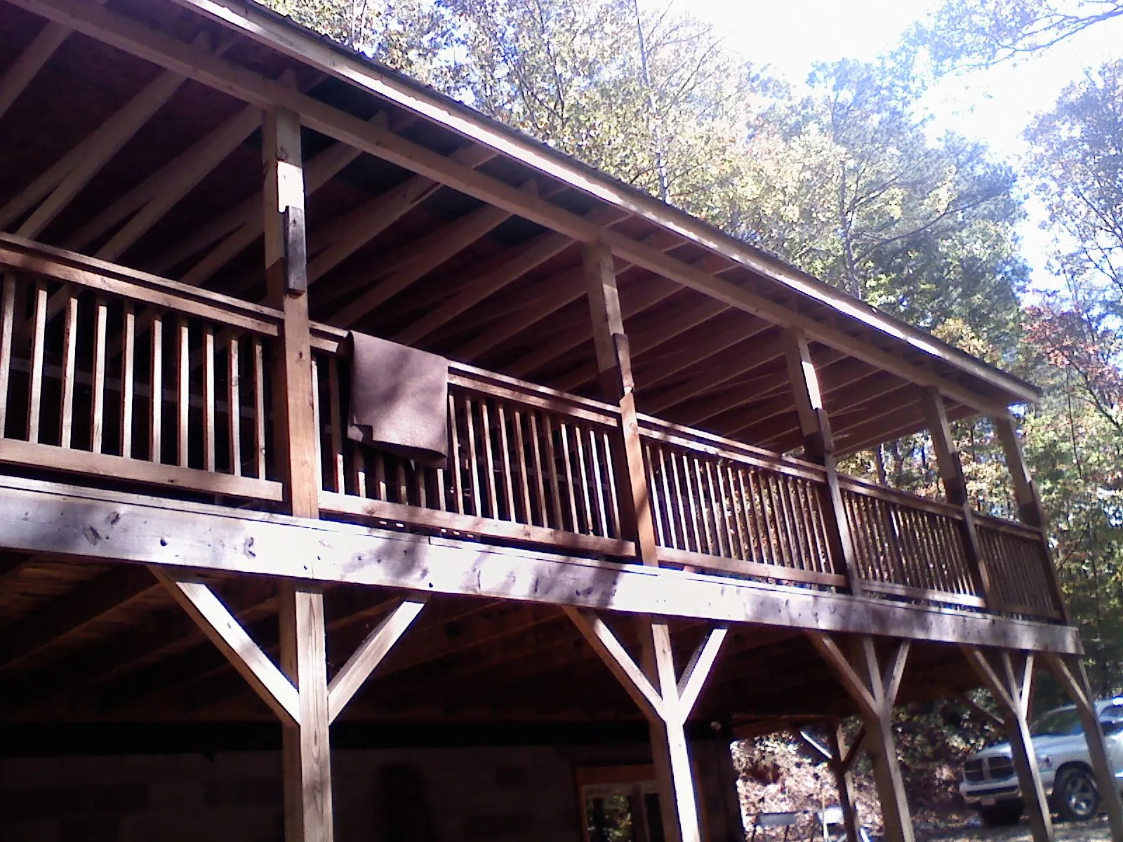 Timber framing under a new elevated porch and deck — Roof Leak Repair in Andover by Roofing Brothers